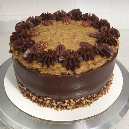 German Chocolate Cake on a cake stand. [german chocolate cake]