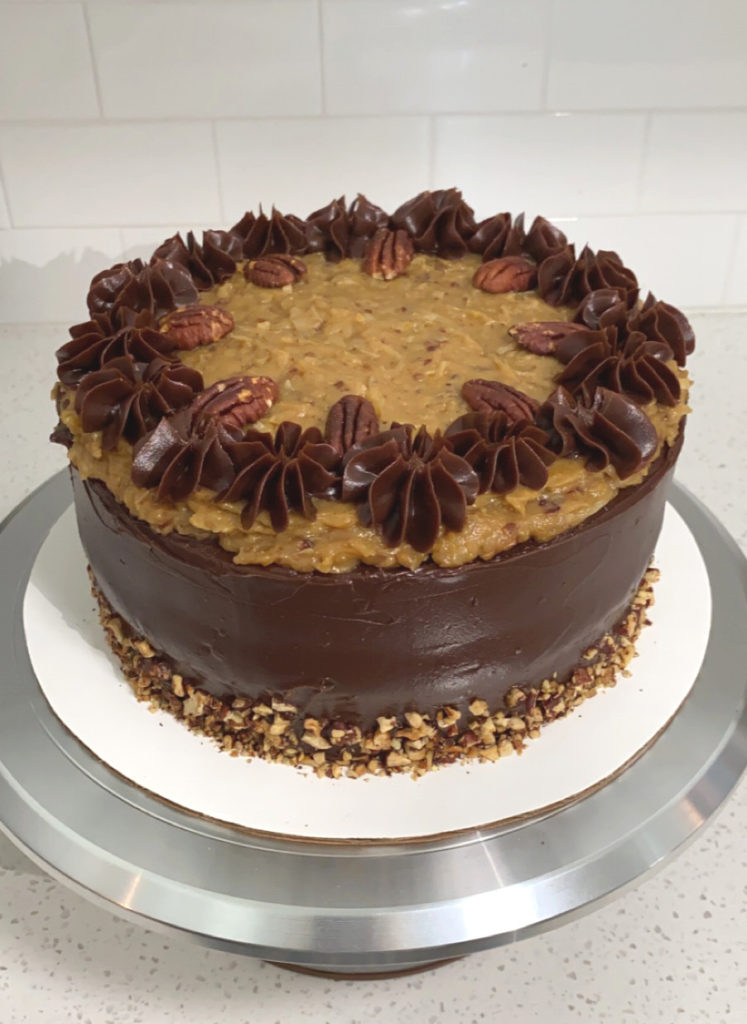 German Chocolate Cake on a cake stand. [german chocolate cake]